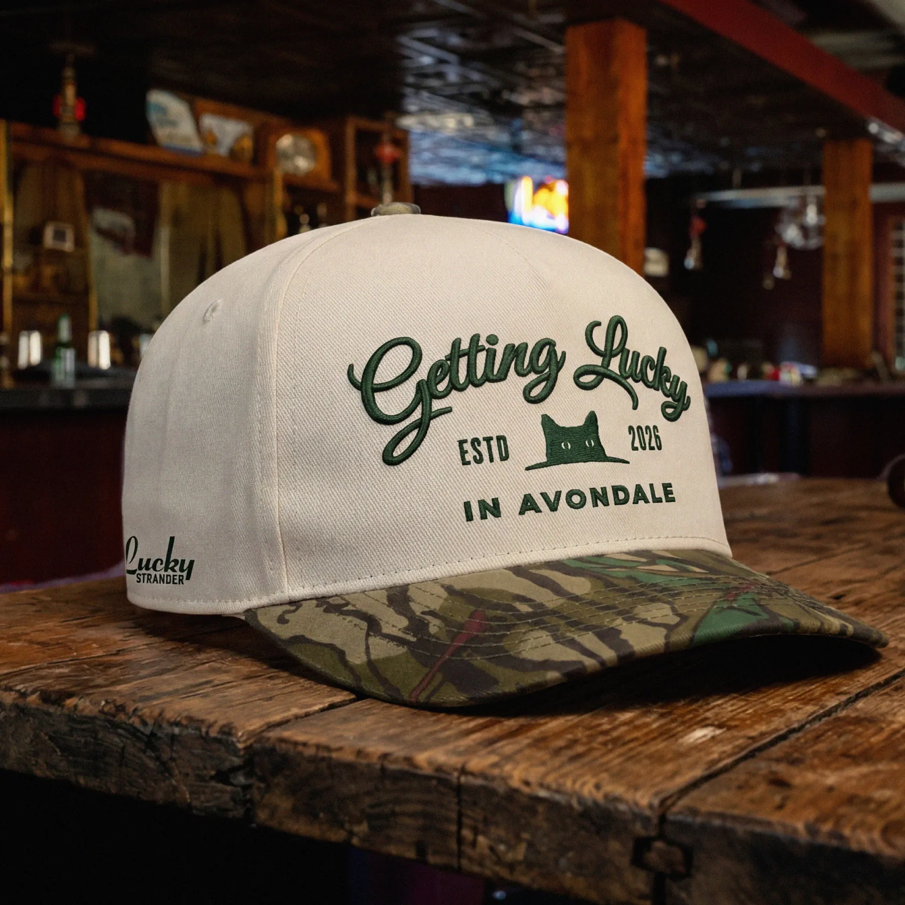 Lucky Stranger branded hat photographed in the bar