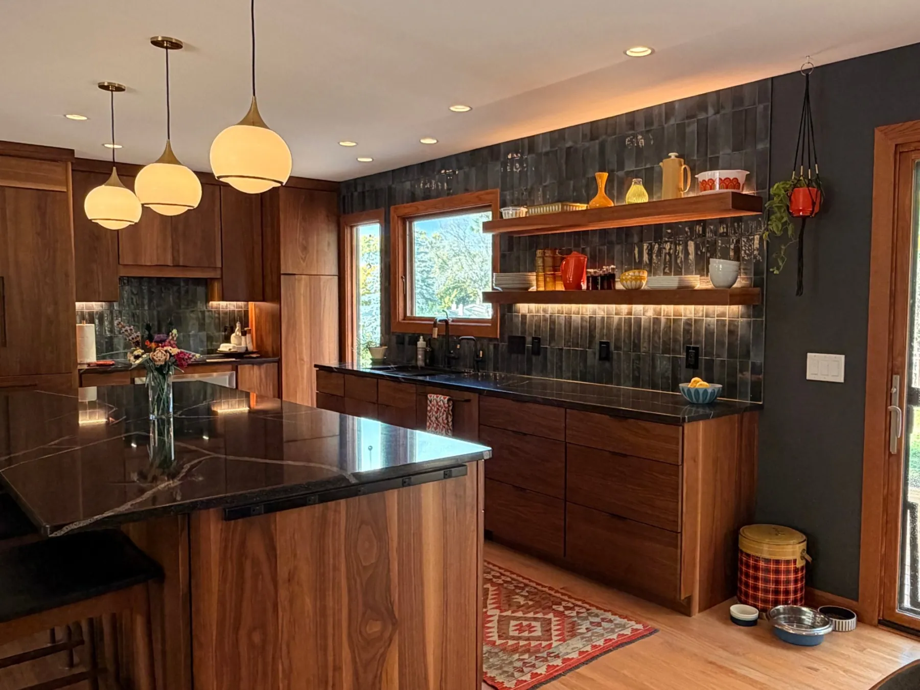 Kitchen after the remodel, with the new patio door in place of the old back door