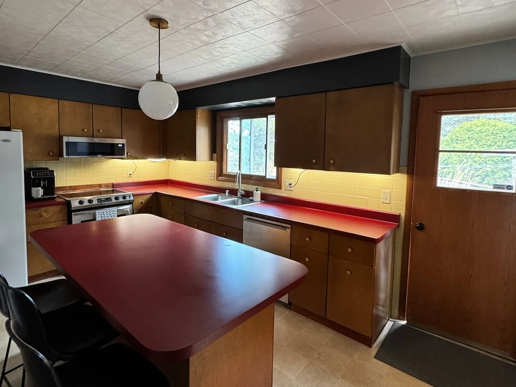 Madison Midcentury Home: Kitchen: the door moves, before