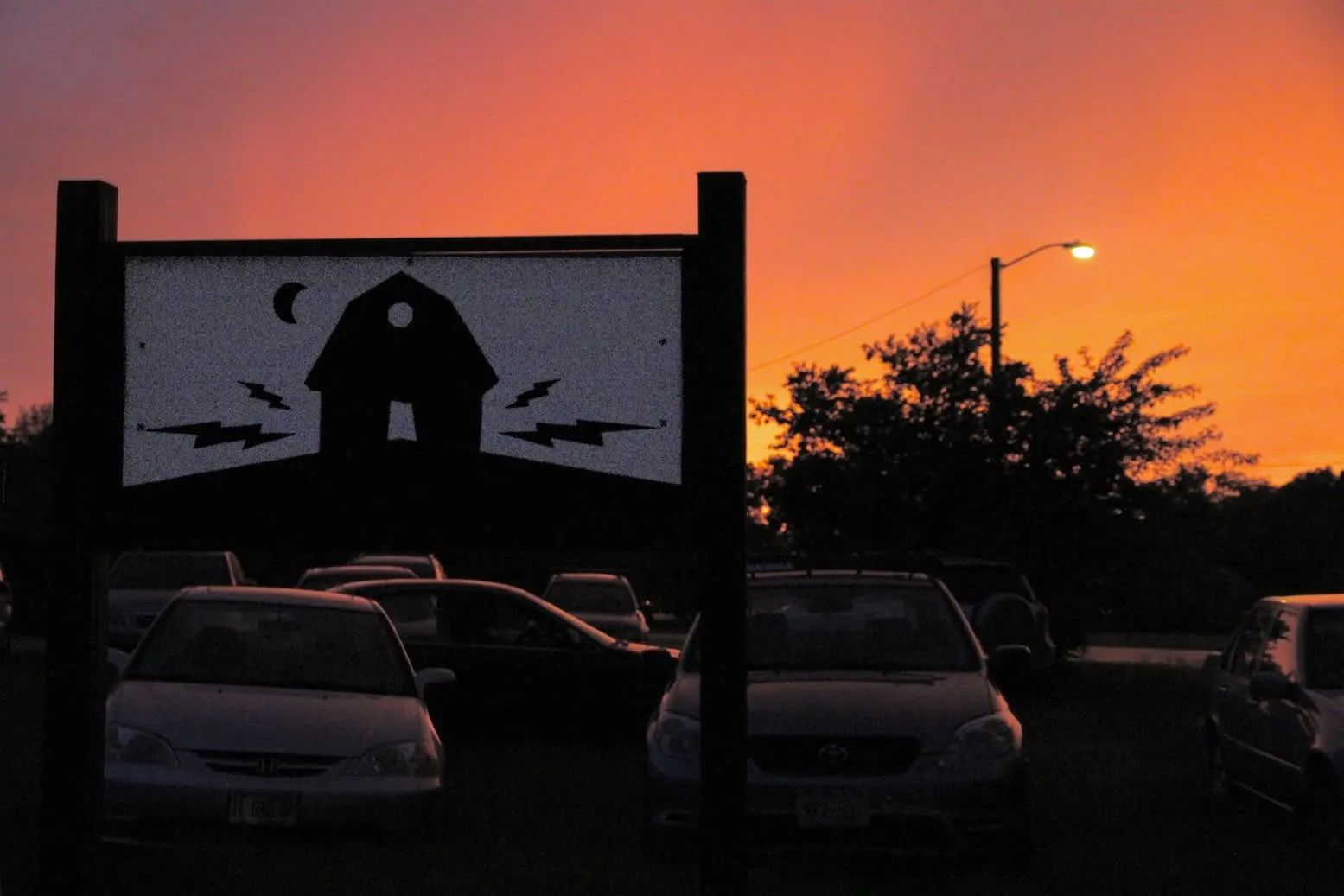 The Shitty Barn: The roadside sign at sunset